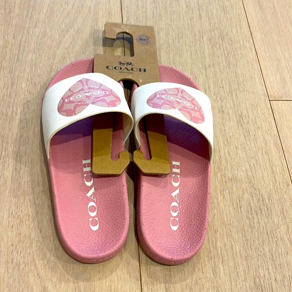 Brand new Coach pink slide sandals!